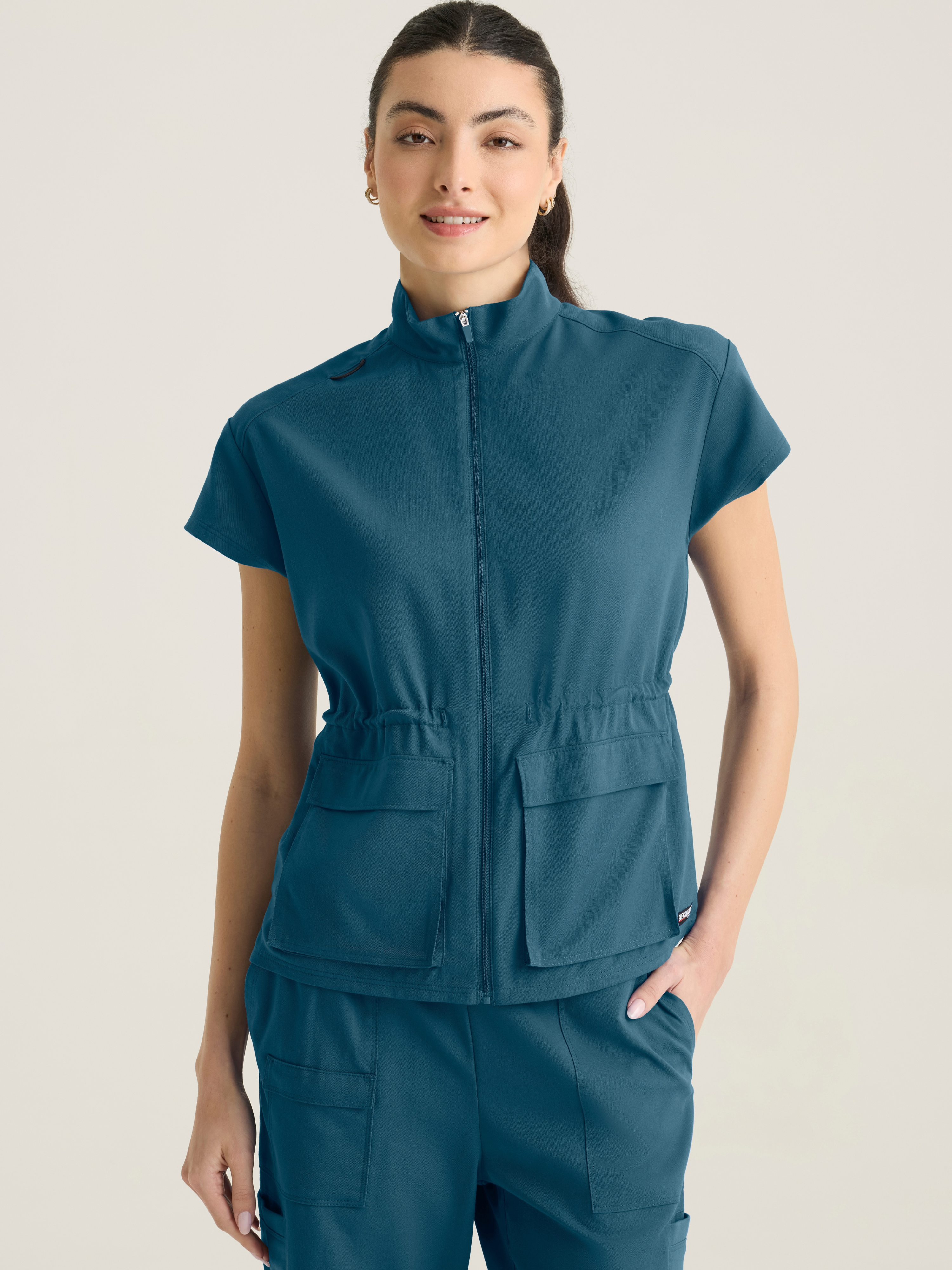 Nina Women's 2-pocket Mock Neck Zip Front Top Grey's Anatomy™ by Barco Spandex Stretch
