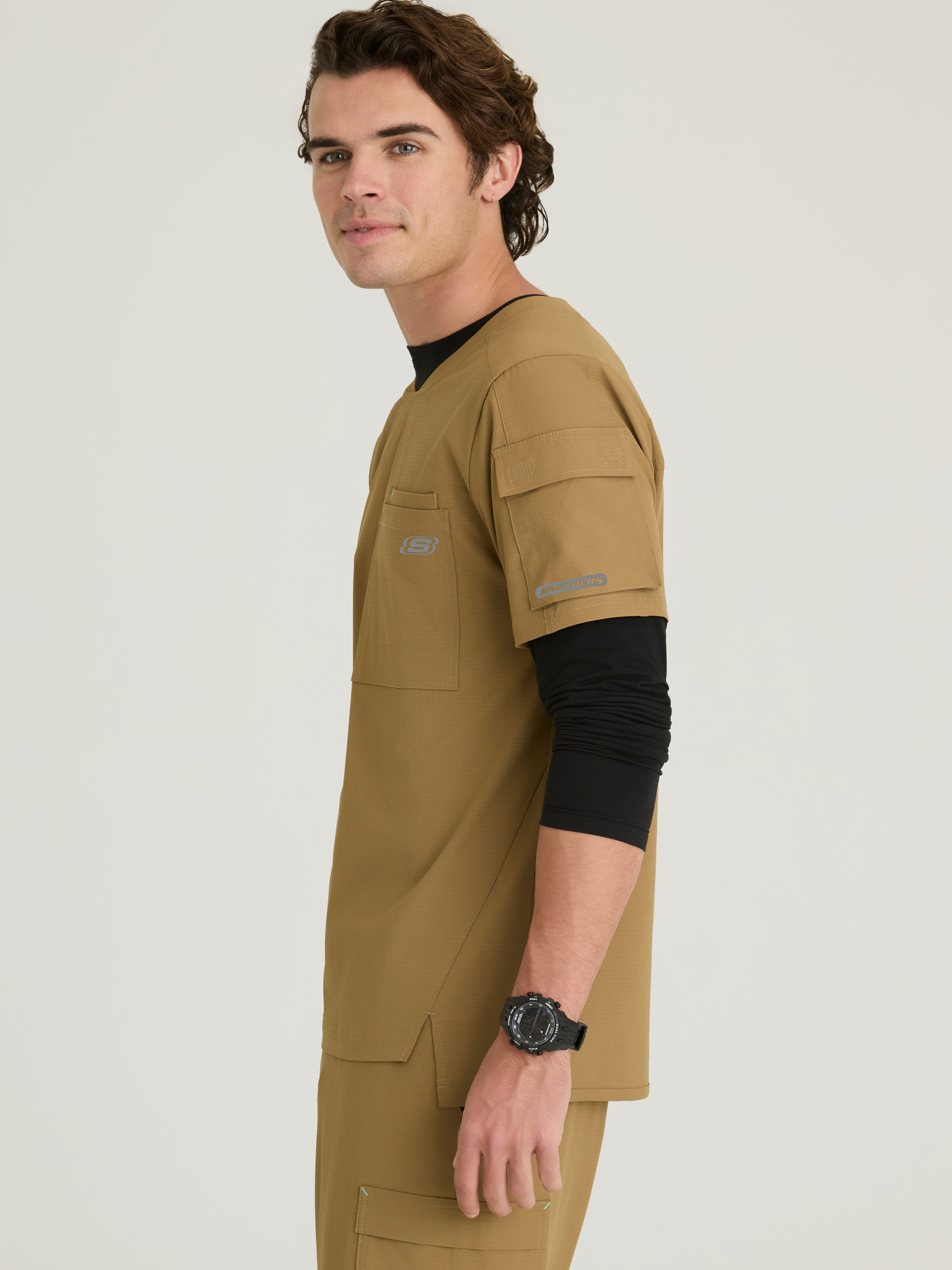 Station 3-Pocket Round Neck High-Low Hem Top Skechers™ by BARCO® Ripstop
