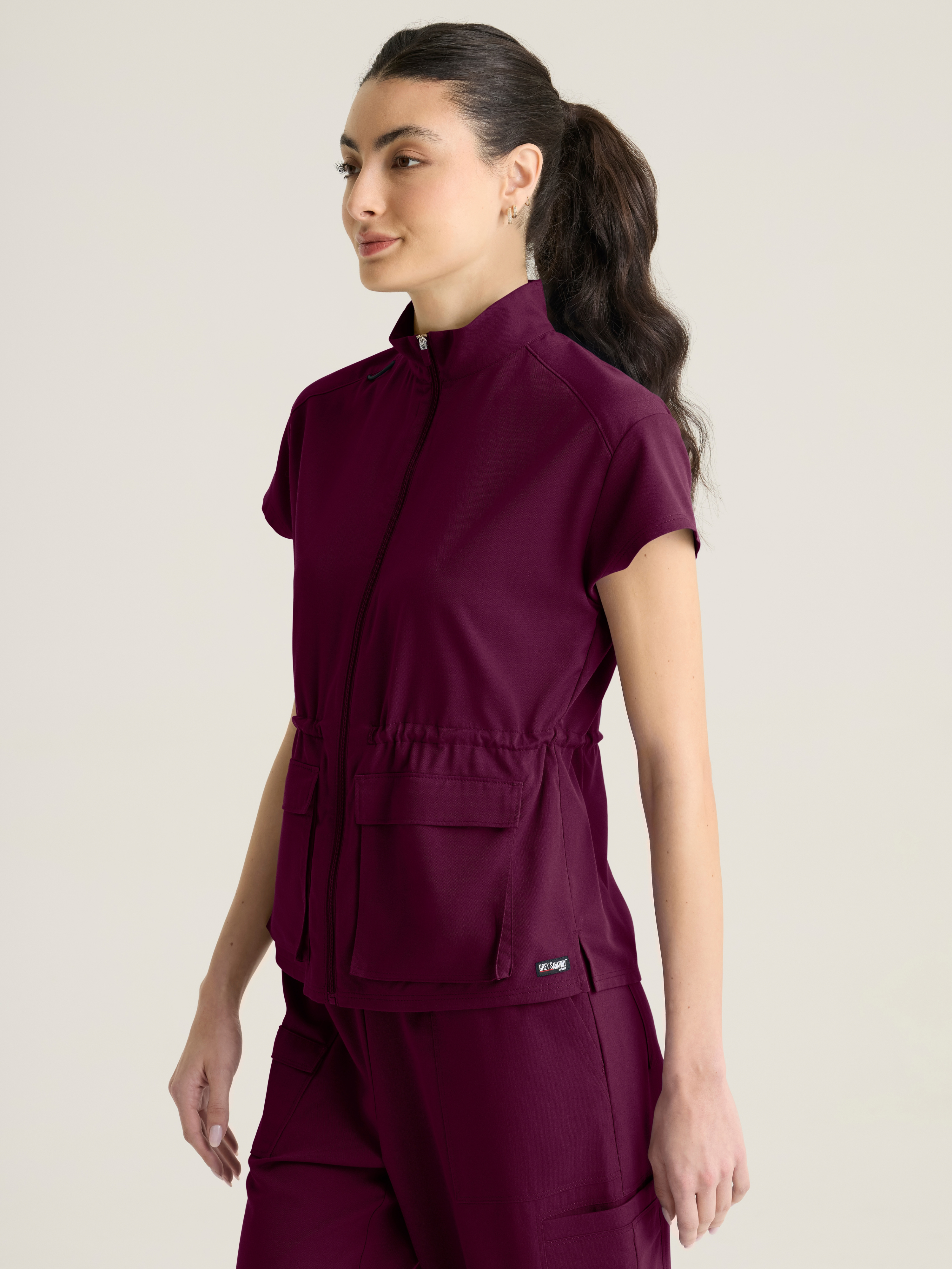 Nina Women's 2-pocket Mock Neck Zip Front Top Grey's Anatomy™ by Barco Spandex Stretch