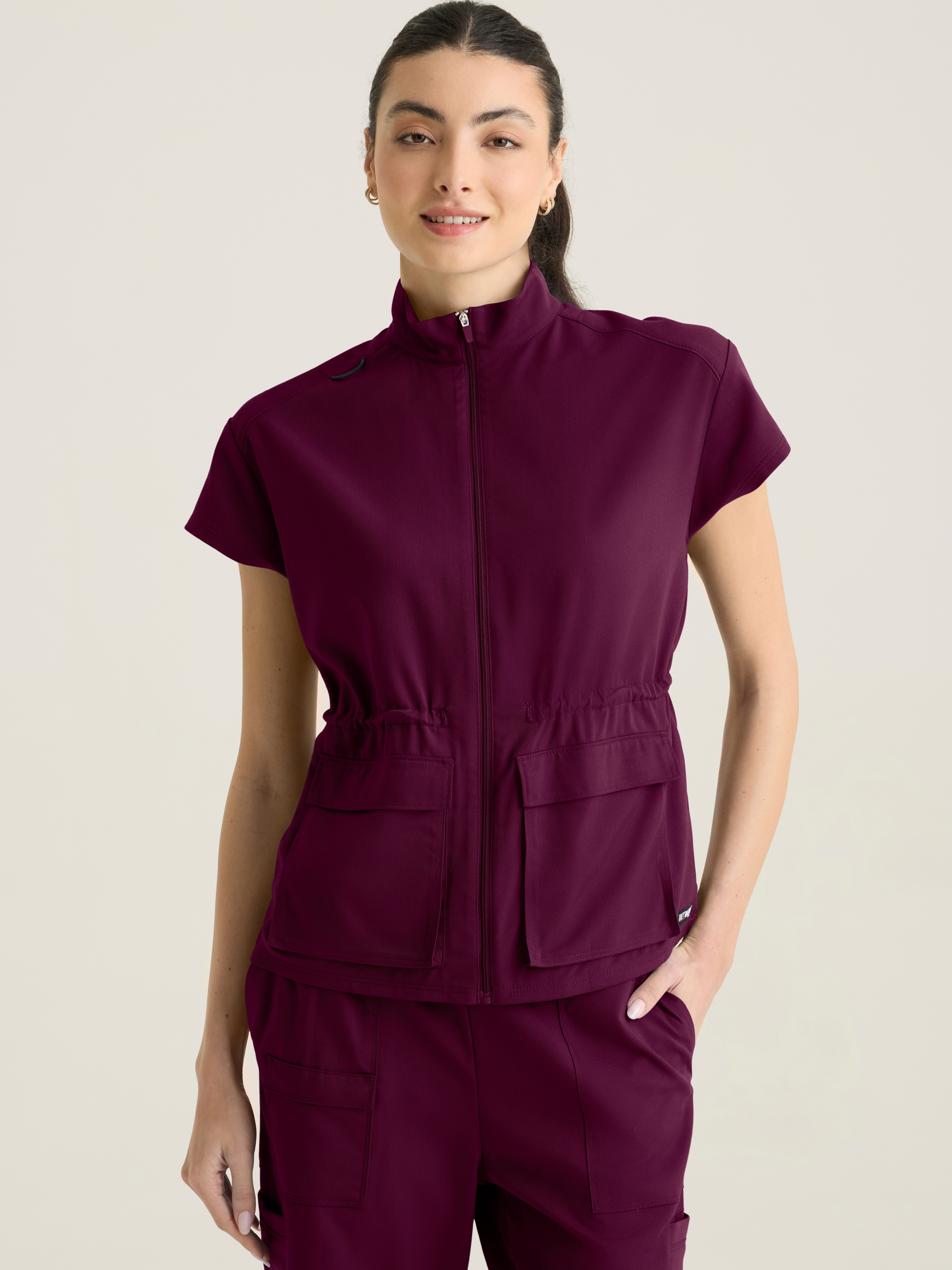 Nina Women's 2-pocket Mock Neck Zip Front Top Grey's Anatomy™ by Barco Spandex Stretch