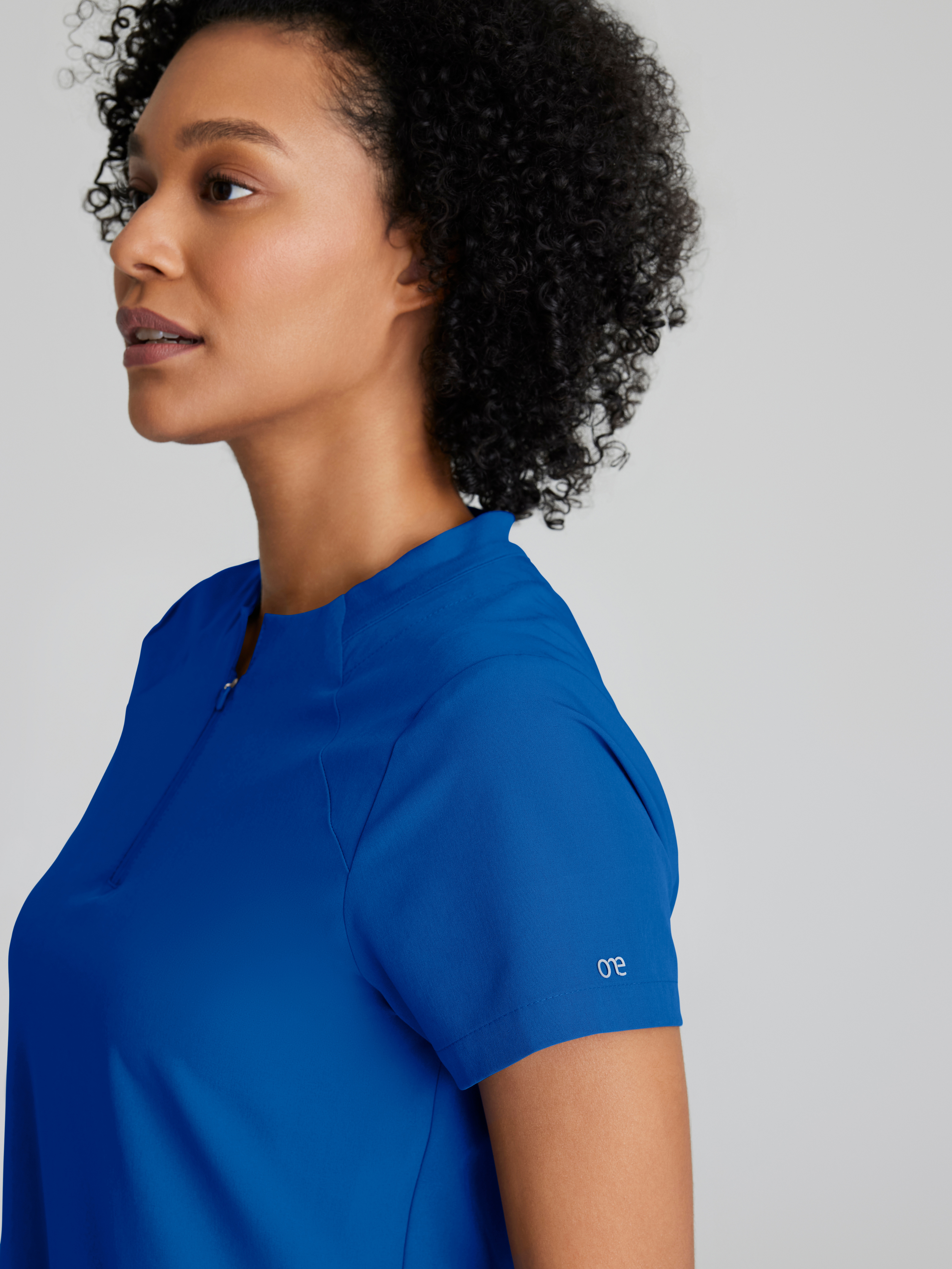 Flux 2-Pocket Banded Zip Collar Top BARCO® One