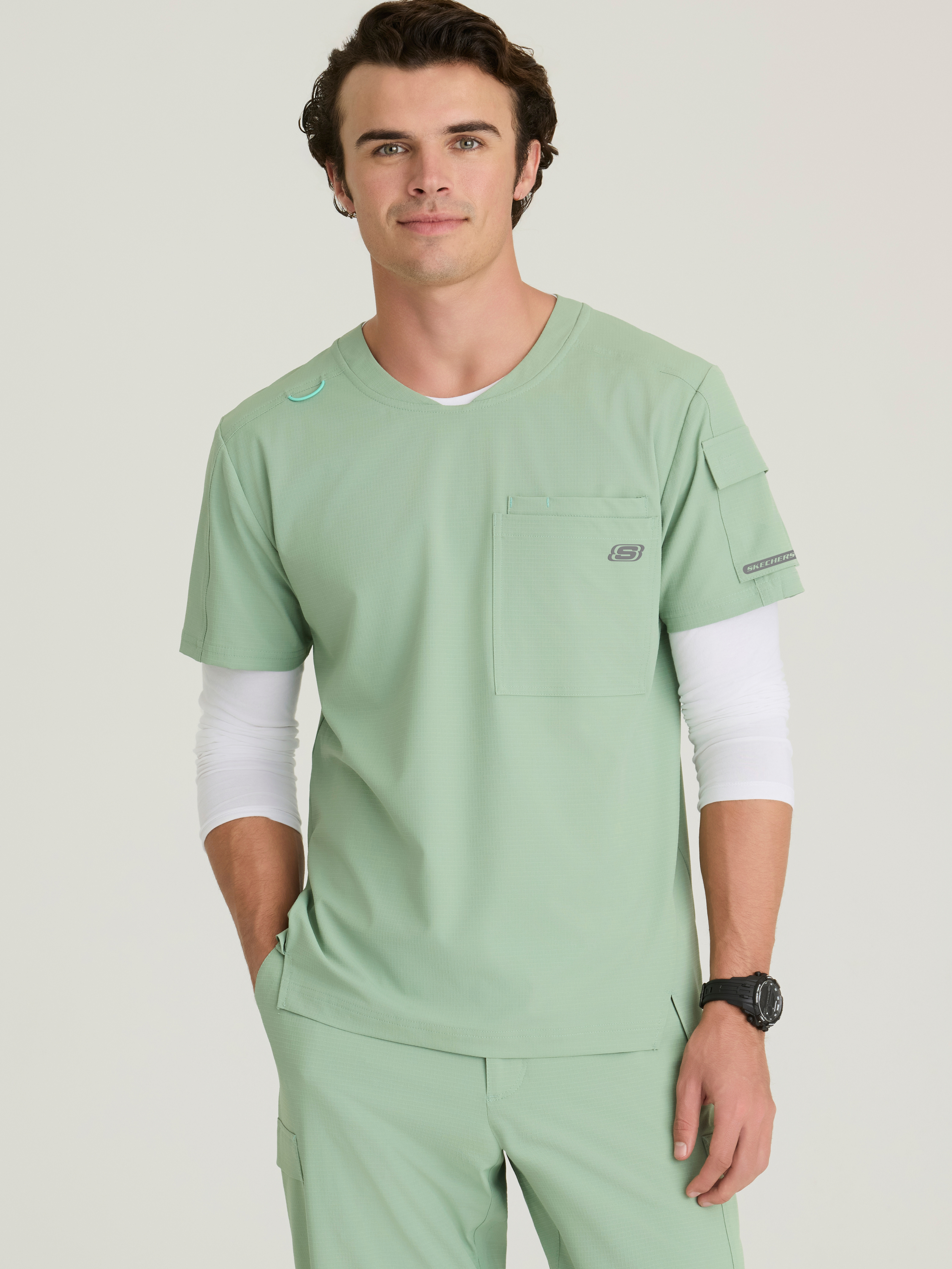 Station 3-Pocket Round Neck High-Low Hem Top Skechers™ by BARCO® Ripstop