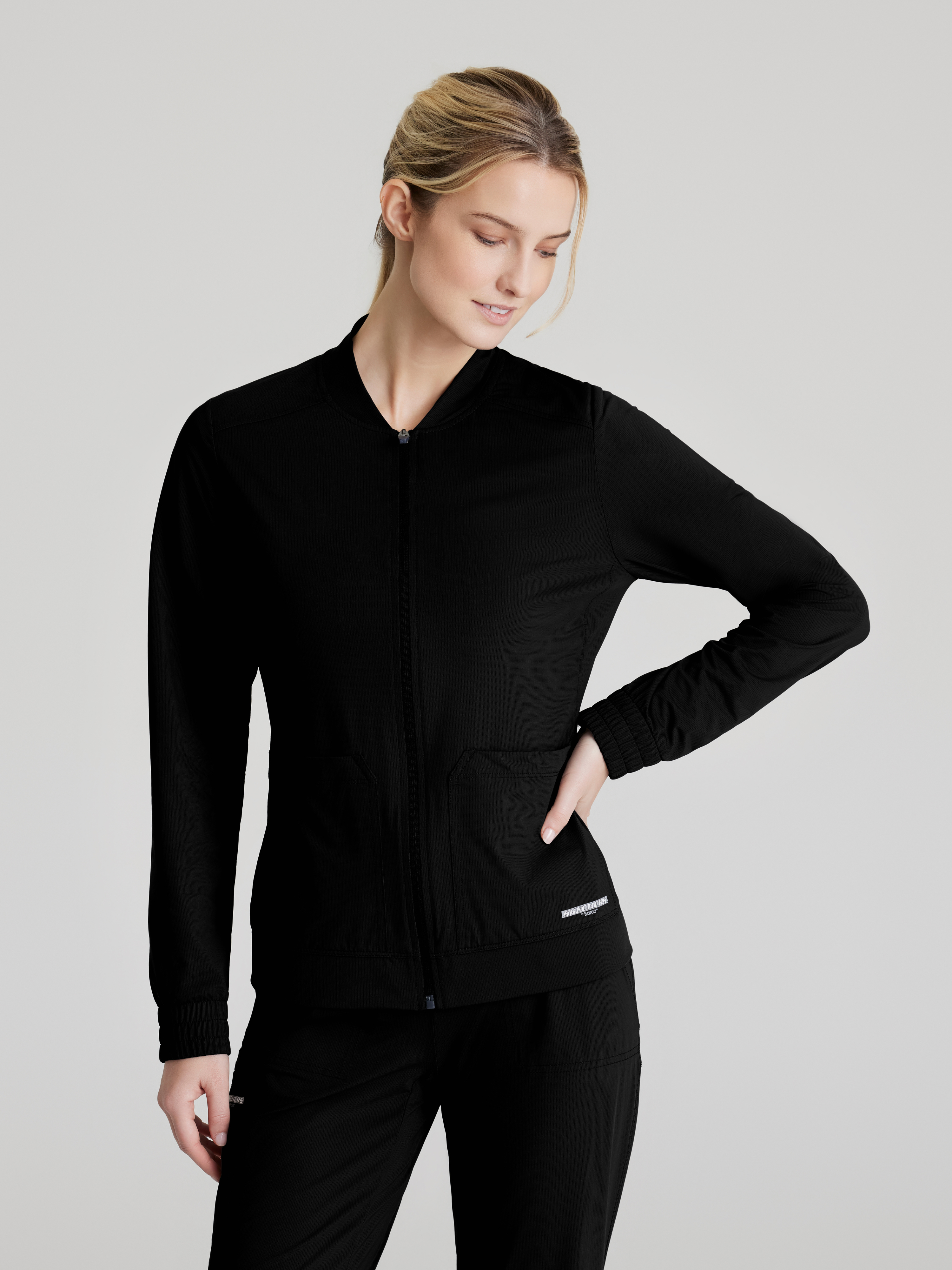 Contour 3-Pocket Front Zipper Warm Up Skechers™ by BARCO® Slip-ins