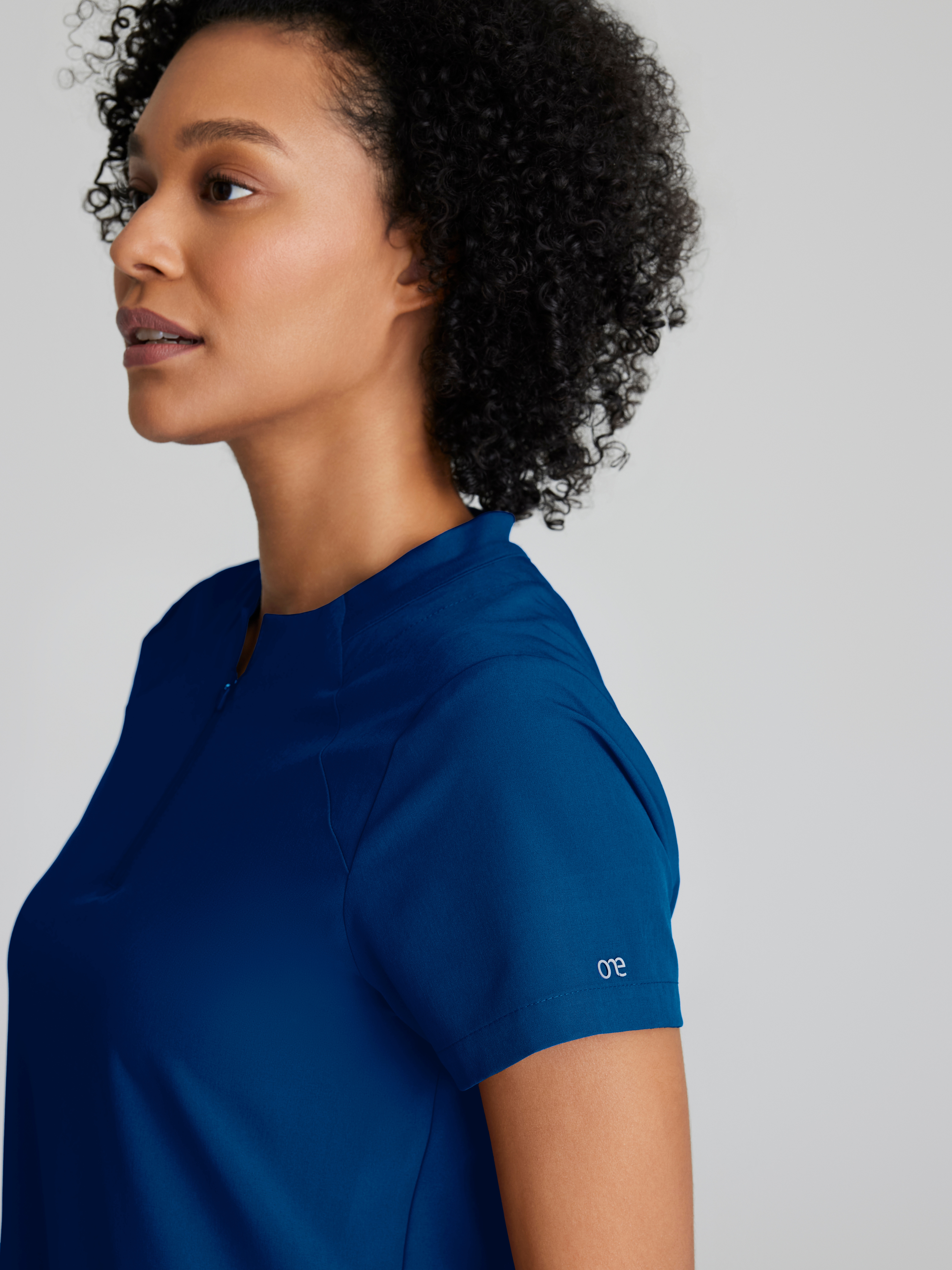 Flux 2-Pocket Banded Zip Collar Top BARCO® One