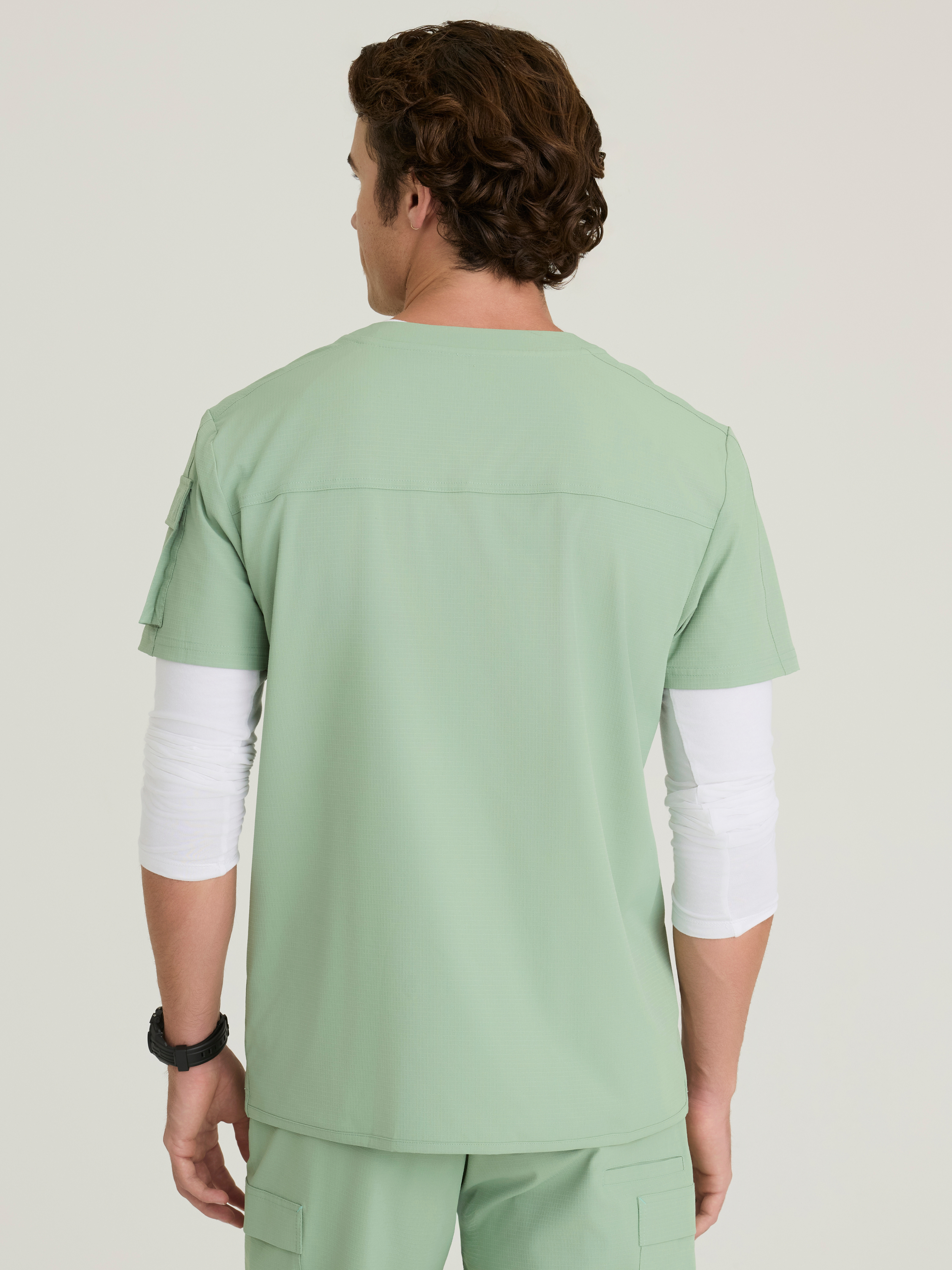Station 3-Pocket Round Neck High-Low Hem Top Skechers™ by BARCO® Ripstop