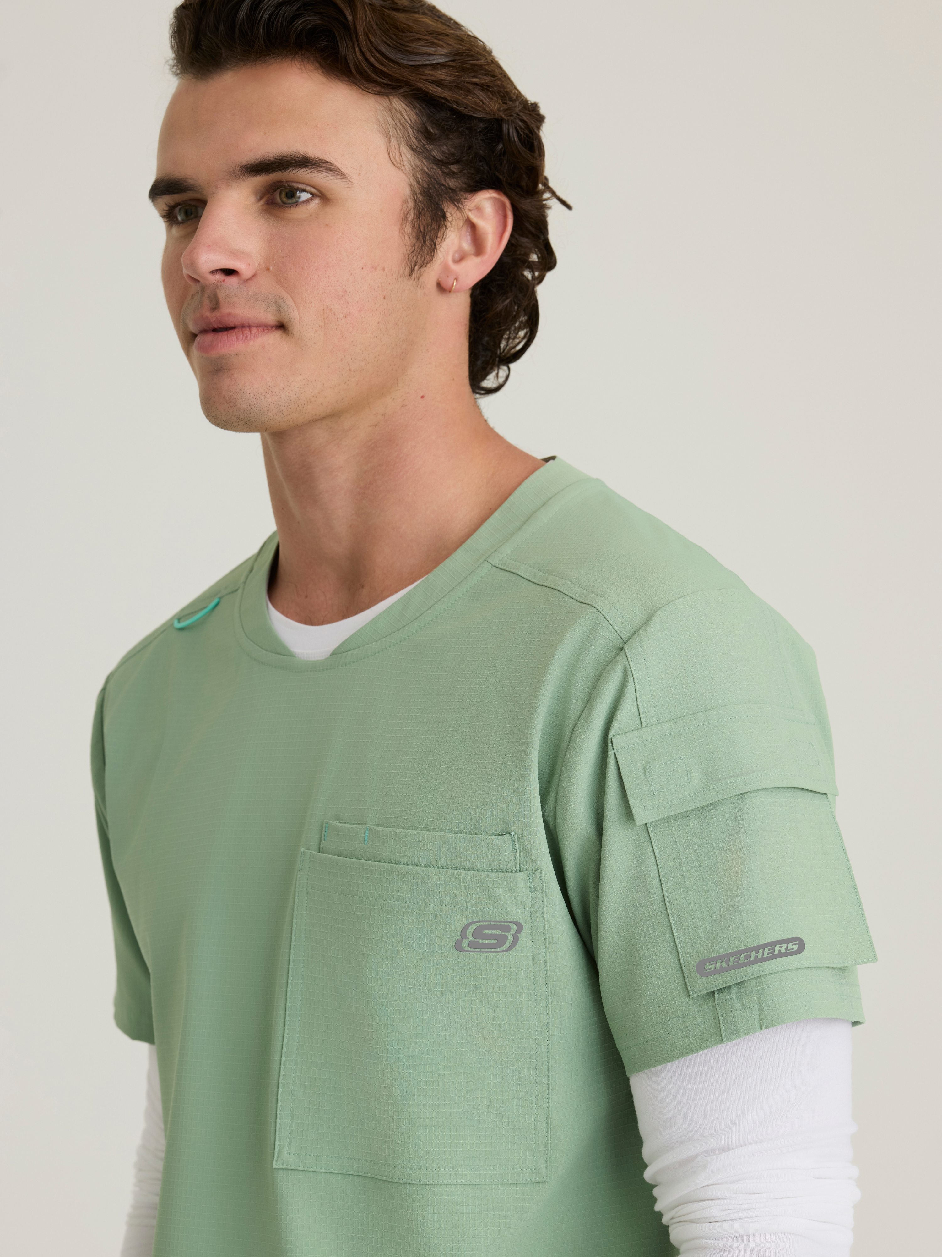 Station 3-Pocket Round Neck High-Low Hem Top Skechers™ by BARCO® Ripstop