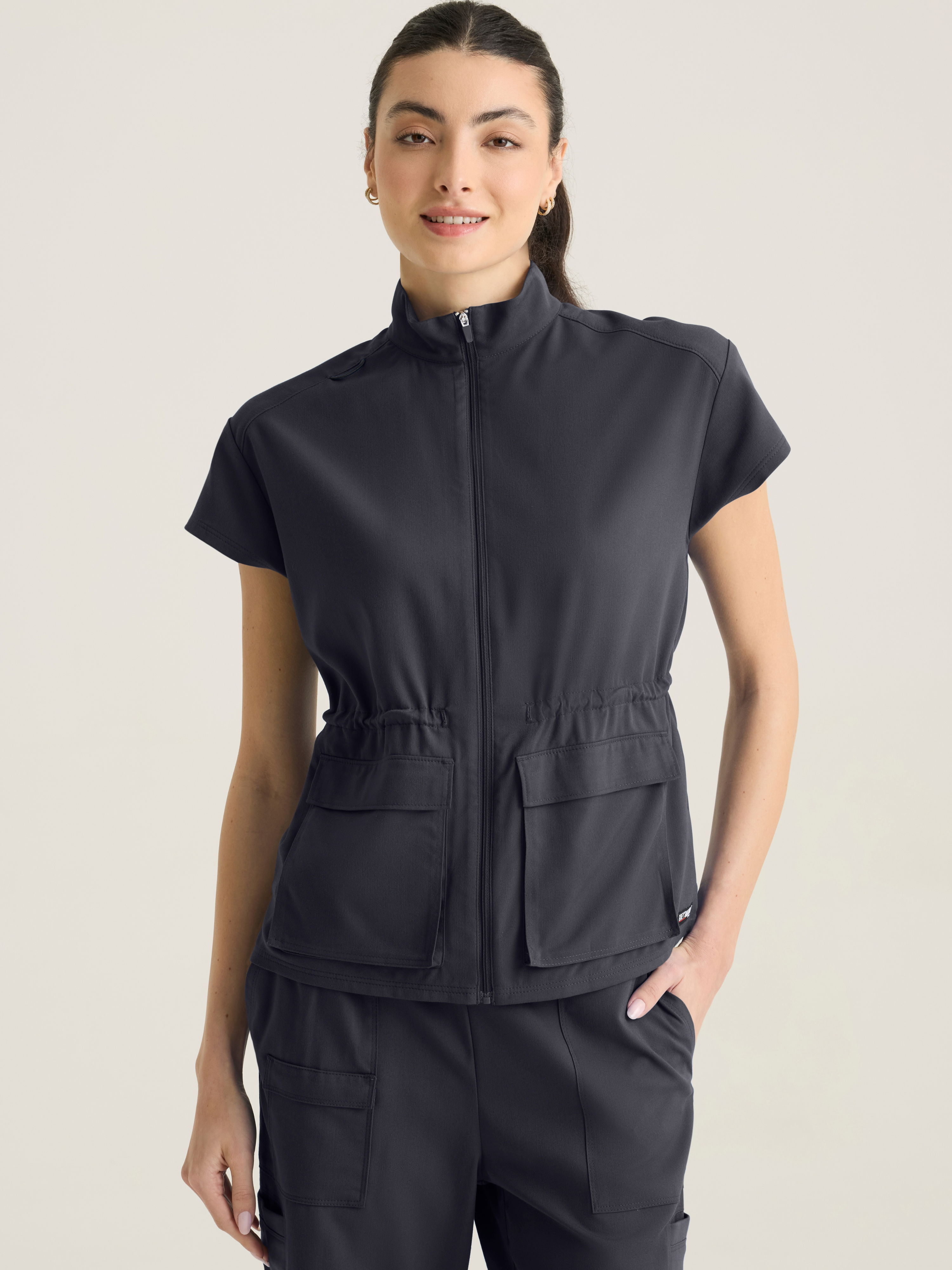 Nina Women's 2-pocket Mock Neck Zip Front Top Grey's Anatomy™ by Barco Spandex Stretch