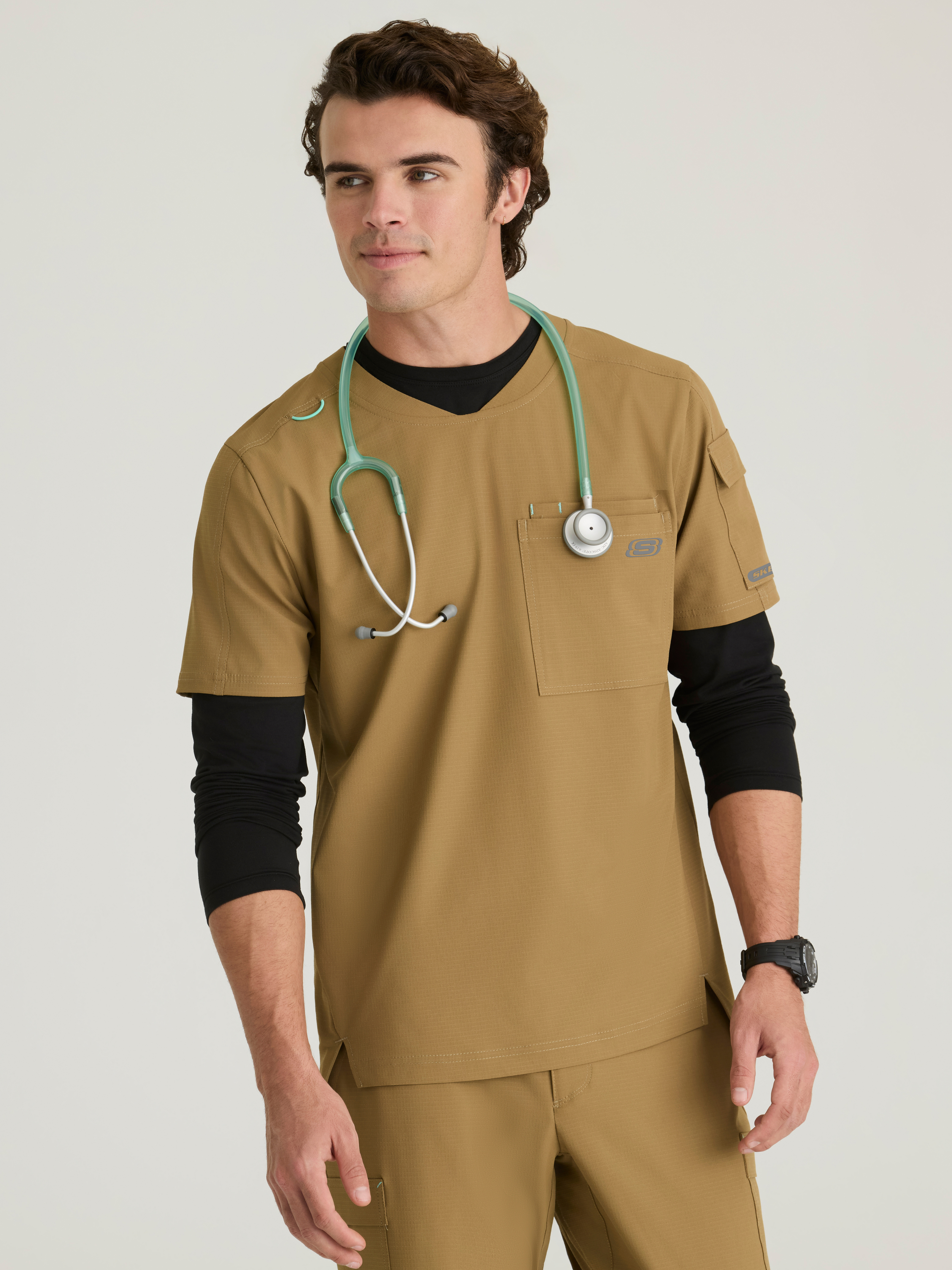 Station 3-Pocket Round Neck High-Low Hem Top Skechers™ by BARCO® Ripstop