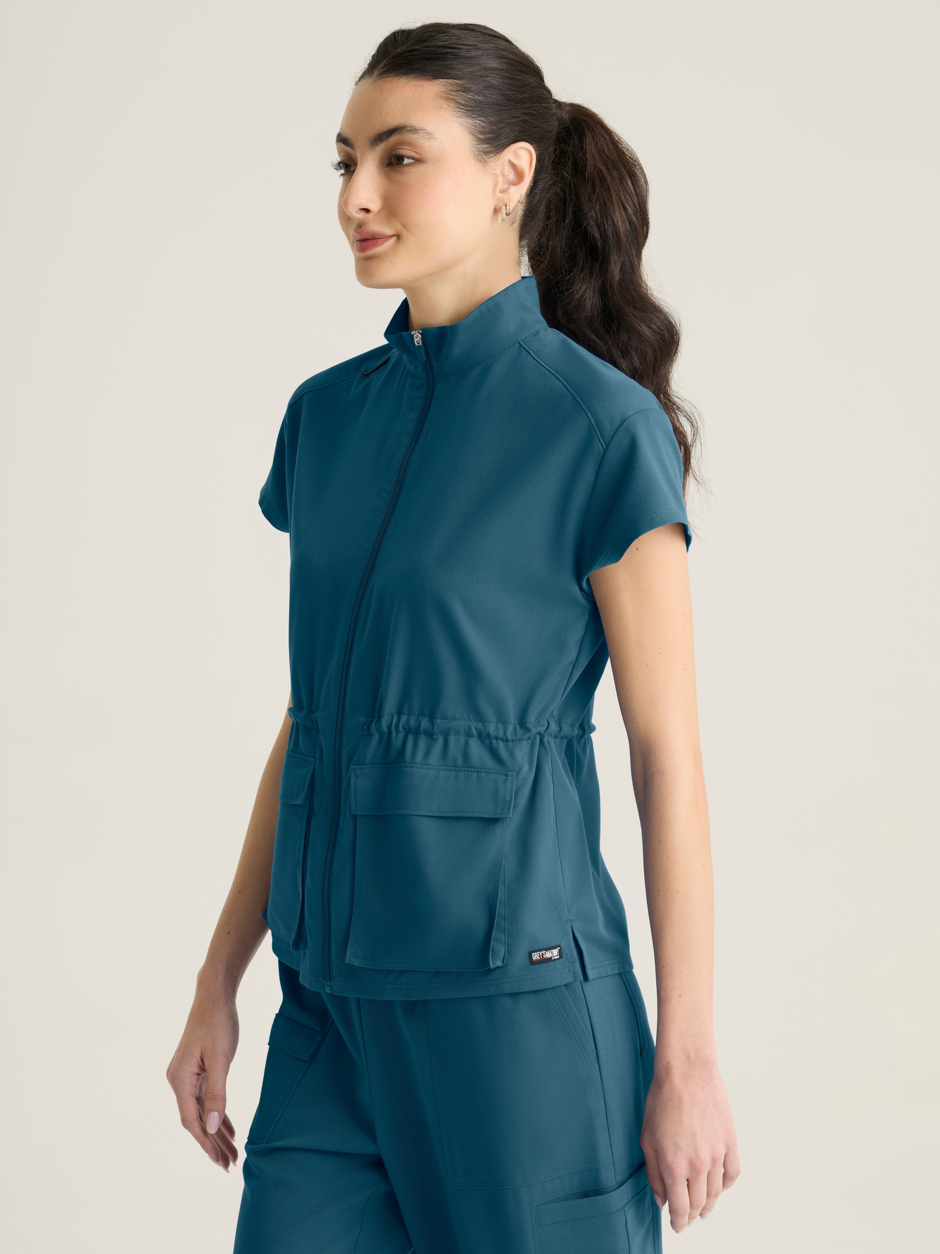 Nina Women's 2-pocket Mock Neck Zip Front Top Grey's Anatomy™ by Barco Spandex Stretch