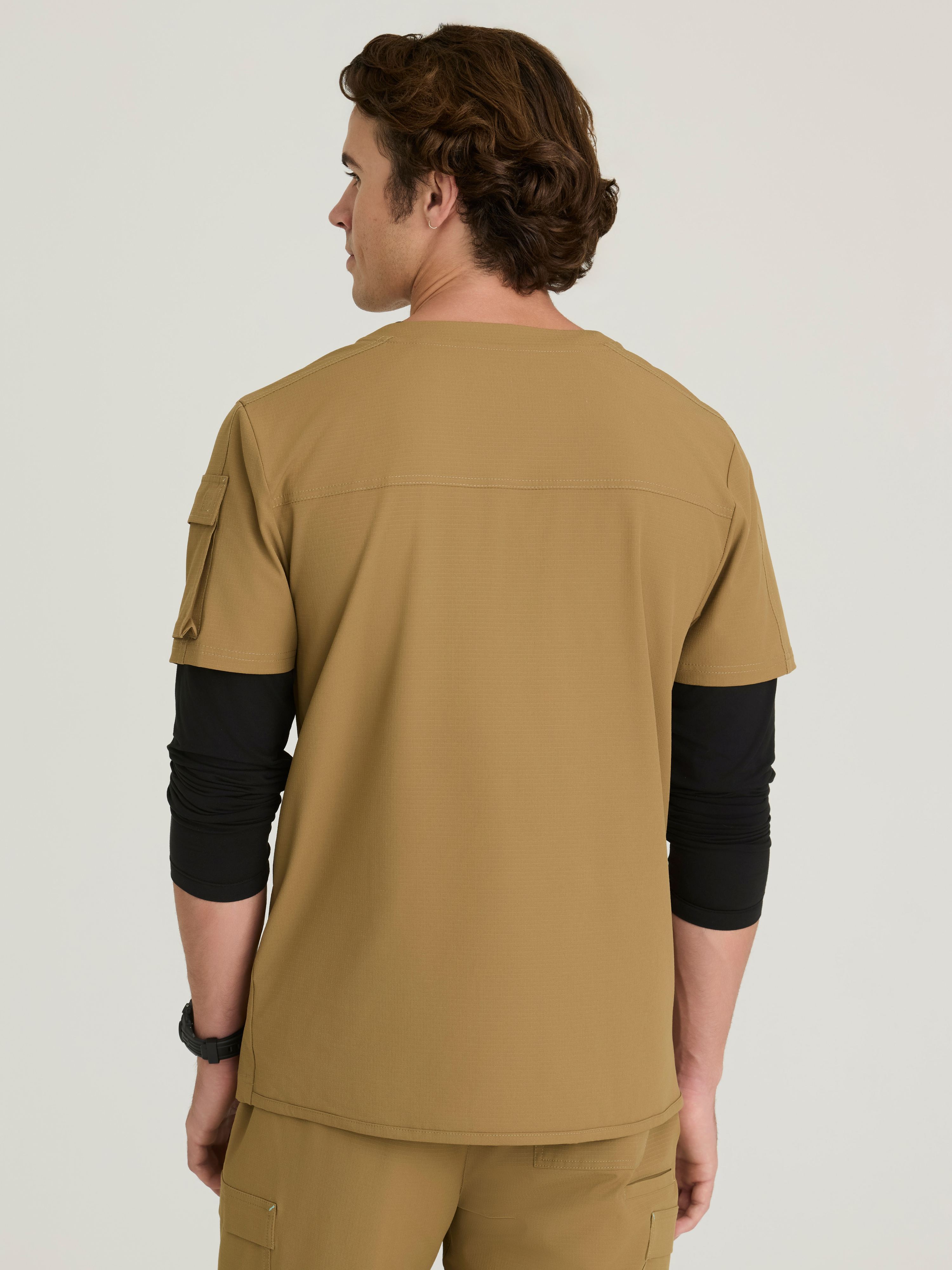 Station 3-Pocket Round Neck High-Low Hem Top Skechers™ by BARCO® Ripstop