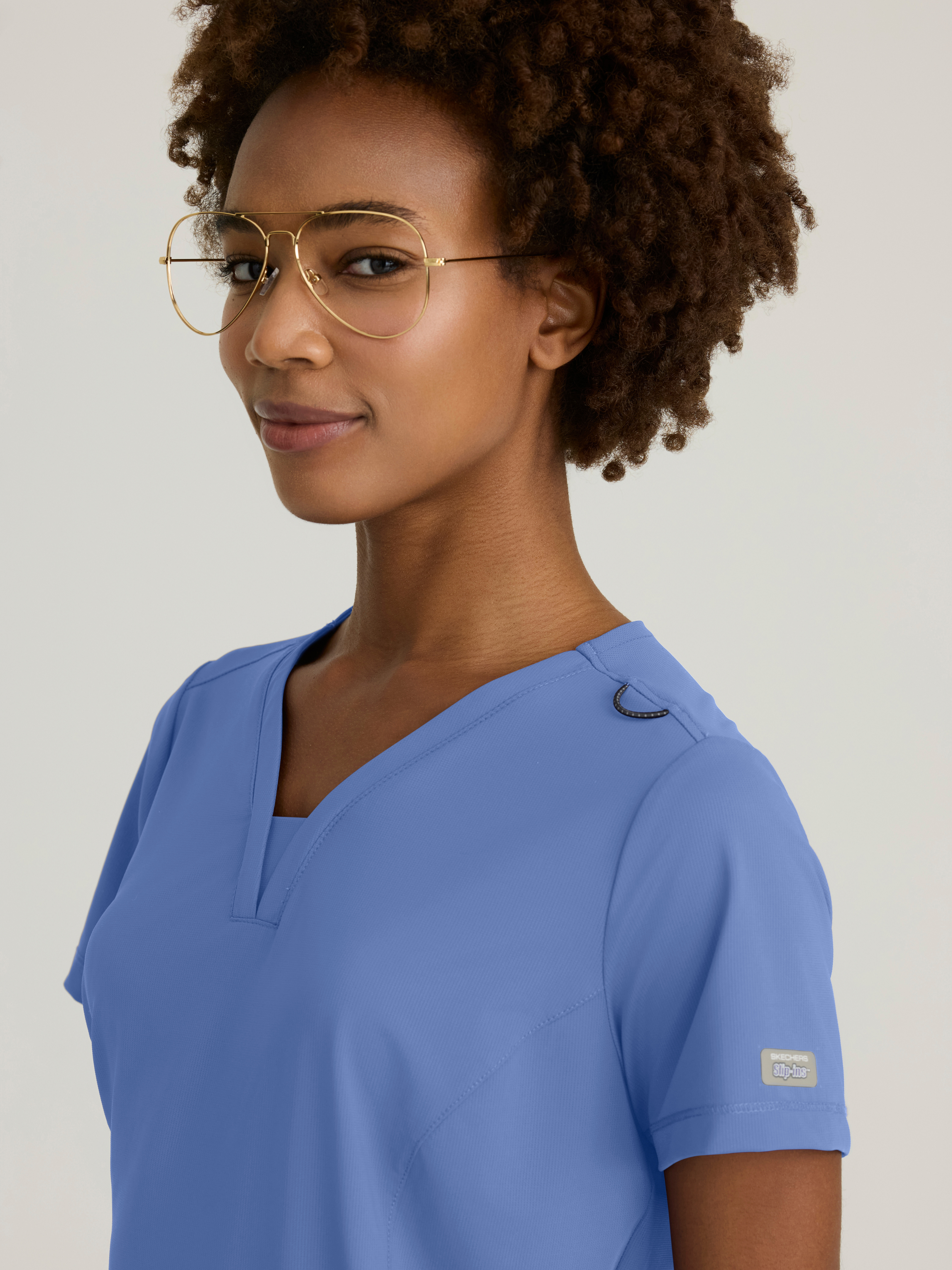 Serene 3-Pocket V-Neck Top Skechers™ by BARCO® Slip-ins