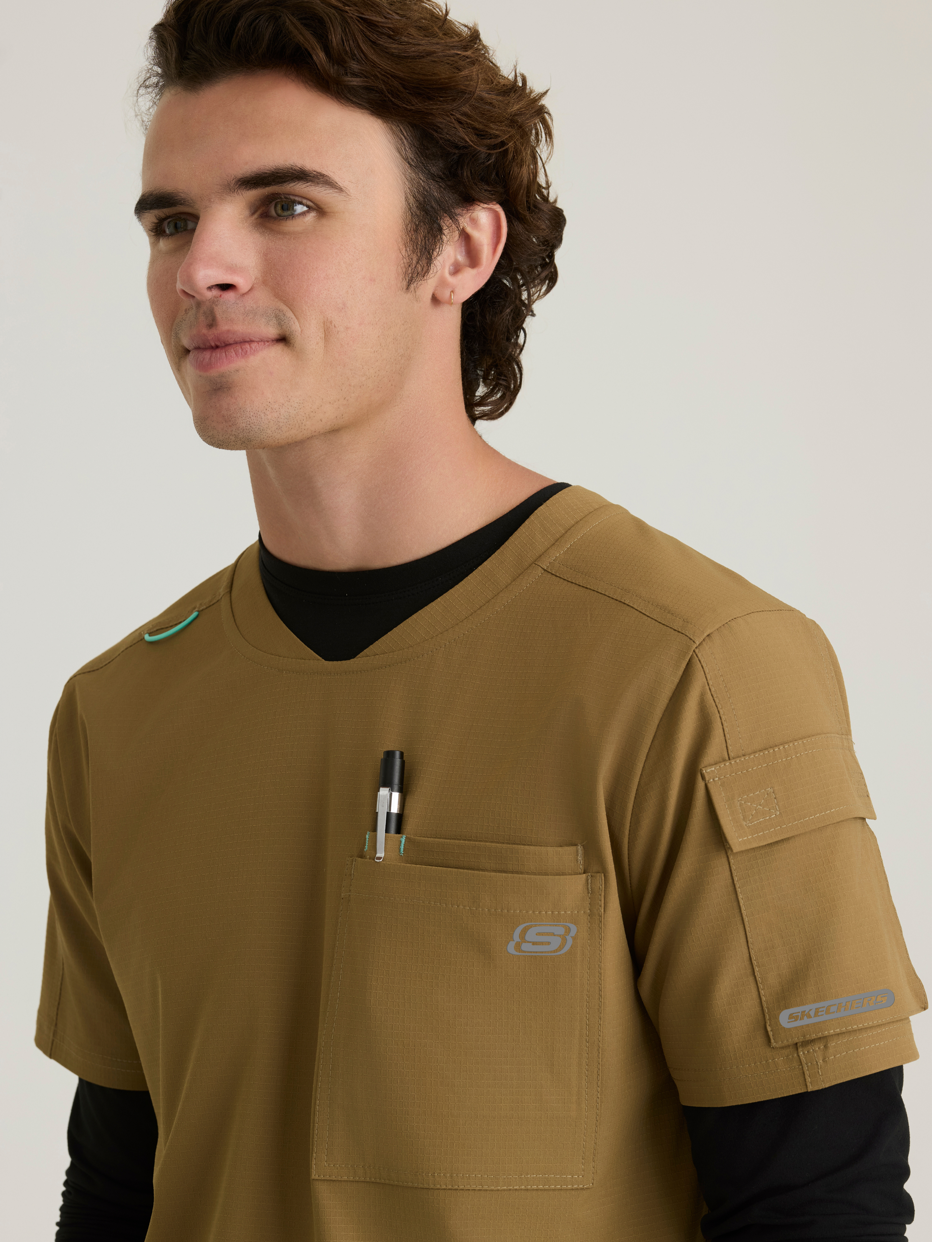 Station 3-Pocket Round Neck High-Low Hem Top Skechers™ by BARCO® Ripstop